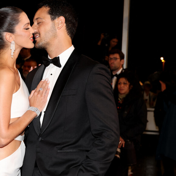 Iris Mittenaere et son fiancé Diego El Glaoui - Montée des marches du film " Le retour (Homecoming) " lors du 76ème Festival International du Film de Cannes, au Palais des Festivals à Cannes. Le 17 mai 2023 © Jacovides-Moreau / Bestimage