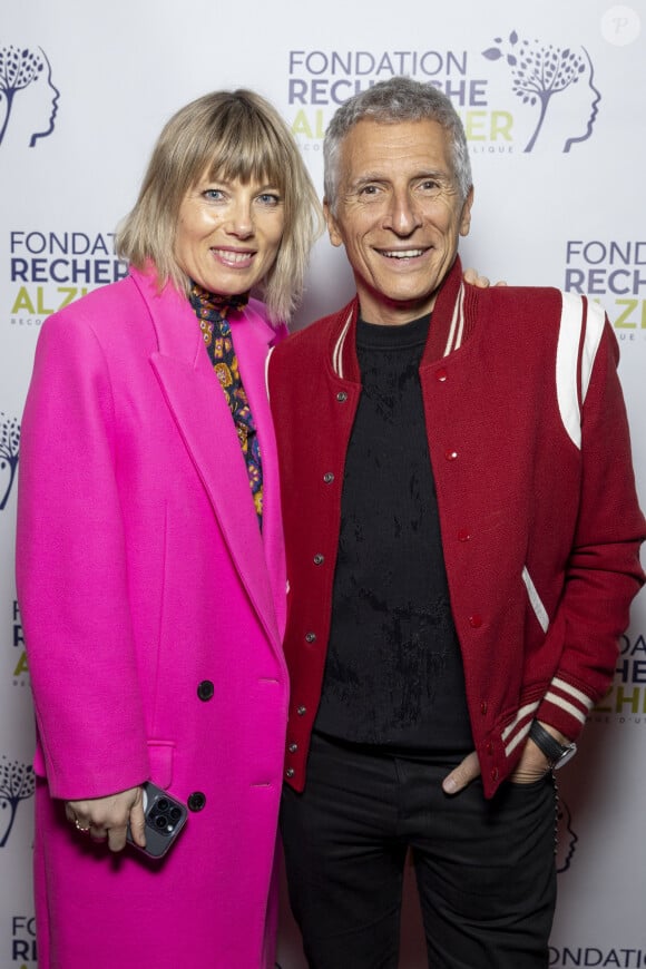 Nagui et sa femme Mélanie Page au photocall du concert du gala des 20 ans de la fondation Recherche Alzheimer "2 générations chantent pour la 3ème" à l'Olympia à Paris le 18 mars 2024. © Cyril Moreau / Bestimage