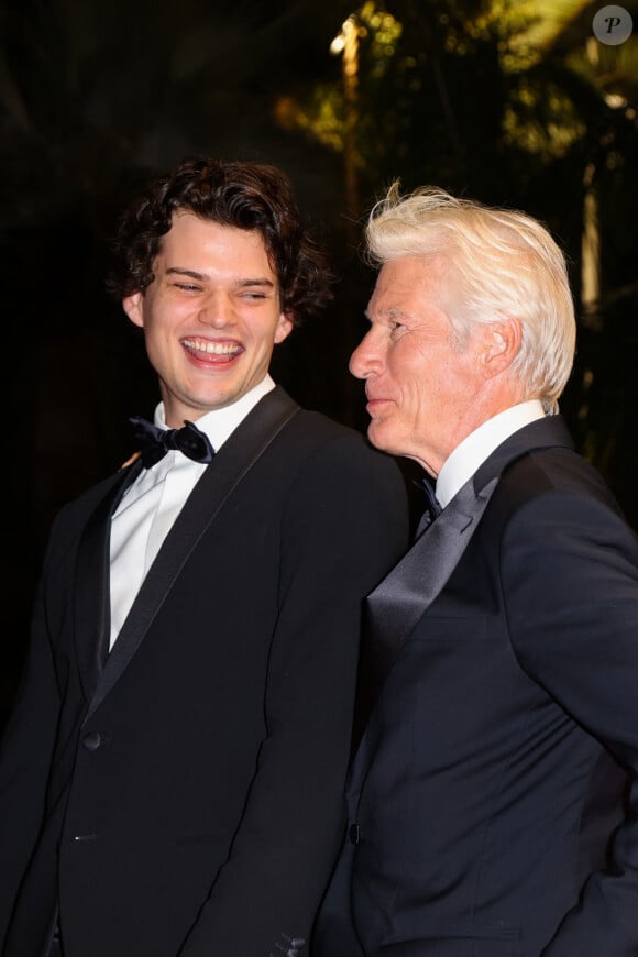 Homer James Jigme Gere et son père Richard Gere - Descente des marches du film "Oh Canada" lors du 77ème Festival International du Film de Cannes, au Palais des Festivals à Cannes. Le 17 mai 2024 © Jacovides-Moreau / Bestimage