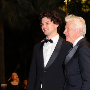Homer James Jigme Gere et son père Richard Gere - Descente des marches du film "Oh Canada" lors du 77ème Festival International du Film de Cannes, au Palais des Festivals à Cannes. 17 mai 2024 © Jacovides-Moreau / Bestimage