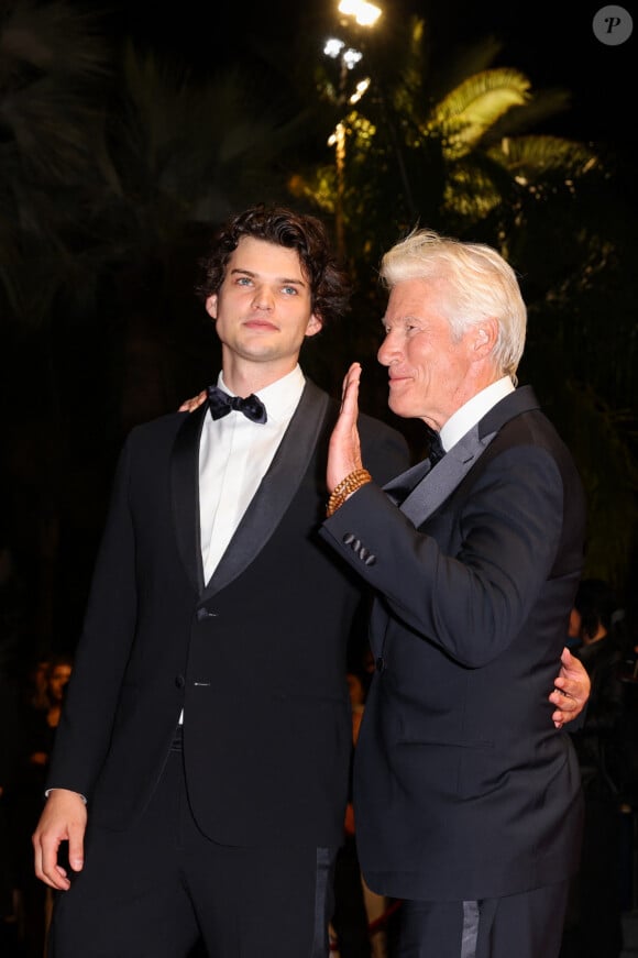 Homer James Jigme Gere et son père Richard Gere - Descente des marches du film "Oh Canada" lors du 77ème Festival International du Film de Cannes, au Palais des Festivals à Cannes. Le 17 mai 2024 © Jacovides-Moreau / Bestimage