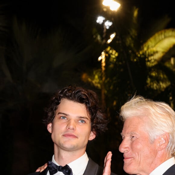 Homer James Jigme Gere et son père Richard Gere - Descente des marches du film "Oh Canada" lors du 77ème Festival International du Film de Cannes, au Palais des Festivals à Cannes. Le 17 mai 2024 © Jacovides-Moreau / Bestimage