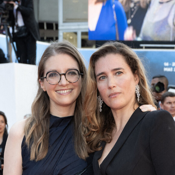 Aurore Bergé et Vahina Giocante assistent au tapis rouge d'"Emilia Perez" lors de la 77e édition du Festival de Cannes au Palais des Festivals le 18 mai 2024 à Cannes, France. David NIVIERE/ABACAPRESS.COM