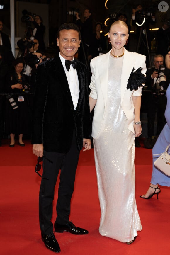 Omar Harfouch et sa femme Yulia (Habillés en Saint-Laurent) - Montée des marches du film " The Substance " lors du 77ème Festival International du Film de Cannes, au Palais des Festivals à Cannes. Le 19 mai 2024 © Jacovides-Moreau / Bestimage