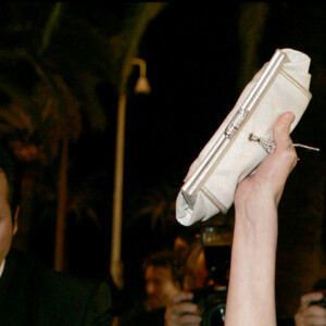 Diane Kruger et Guilaume Canet - 58e festival de Cannes en 2005 pour la montée des Marches du film "Joyeux Noël"