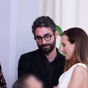 Camille Cottin accompagnée de son compagnon Benjamin Mahon et de leur fille Anna Paloma au photocall de cérémonie de clôture du 20ème Festival International du Film de Marrakech, Maroc, le 2 décembre 2023. © Dominique Jacovides/Bestimage 