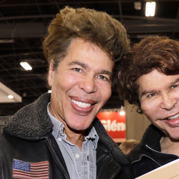 Igor et Grichka Bogdanov (Bogdanoff) expose au "Salon du Livre de Paris 2019 (Livre Paris)" à la Porte de Versailles à Paris, le 28 mars 2019. © Cédric Perrin/Bestimage