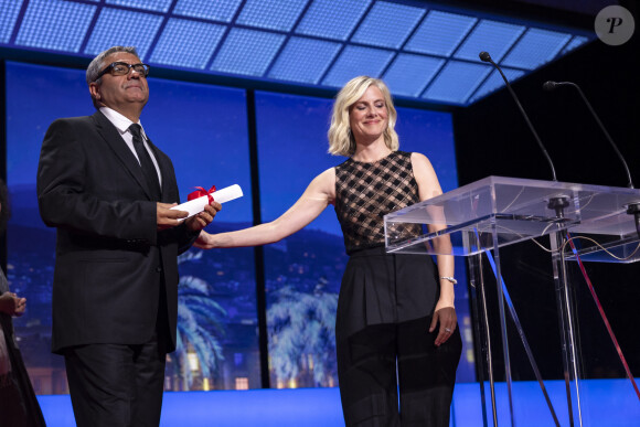 Mélanie Laurent, Mohammad Rasoulof (Prix Spécial pour " The seed of the sacred fig " (" Les Graines du figuier sauvage ")) - Cérémonie de clôture du 77ème Festival International du Film de Cannes au Palais des Festivals à Cannes. Le 25 mai 2024. © Borde-Jacovides-Moreau / Bestimage 