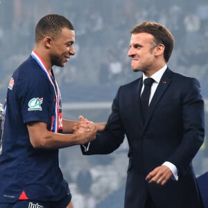 Kylian Mbappe ( 7 - PSG ) and Emmanuel Macron 