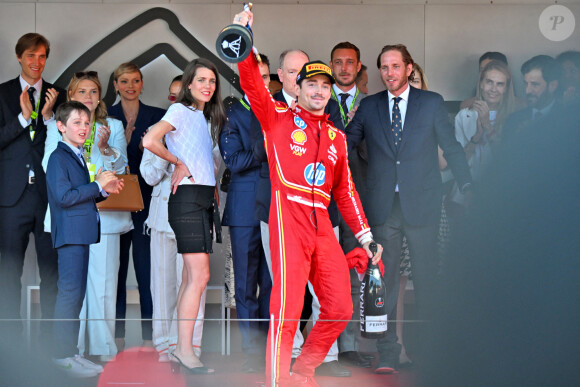 Charles Leclerc, le prince Albert II de Monaco, la princesse Charlène de Monaco, Pierre Casiraghi, Andrea Casiraghi, Tatiana Casiraghi (Tatiana Santa Domingo), Charlotte Casiraghi et Raphaël Elmaleh, Marie Chevallier, Louis Ducruet, la princesse Alexandra de Hanovre, Ben-Sylvester Strautmann, Beatrice Borromeo - Le prince Albert II de Monaco et la princesse Charlène de Monaco ne cachent pas leurs joies et leurs émotions en remettant à Charles Leclerc le trophée du vainqueur du Grand Prix de Formule 1 (F1) de Monaco. Monaco, le 26 mai 2024. © Bruno Bebert/Bestimage 