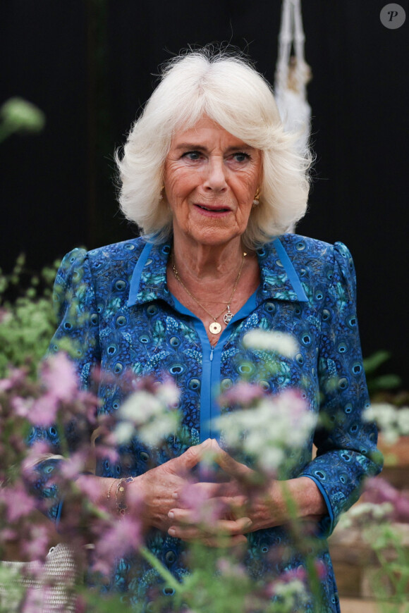 Mais ils n'ont pas eu d'autres choix que de prendre publiquement la parole. 
Le roi Charles III d'Angleterre et Camilla Parker Bowles, reine consort d'Angleterre, visitent le RHS Chelsea Flower Show. 