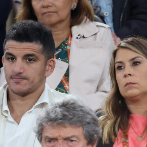 Marion Bartoli et son mari Yahya Boumediene - Célébrités dans les tribunes des Internationaux de France de tennis de Roland Garros 2024 à Paris le 27 mai 2024. © Moreau-Jacovides/Bestimage