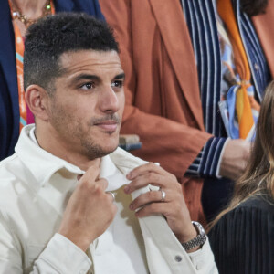 Marion Bartoli et son mari Yahya Boumediene - Célébrités dans les tribunes des Internationaux de France de tennis de Roland Garros 2024 à Paris le 27 mai 2024. © Moreau-Jacovides/Bestimage