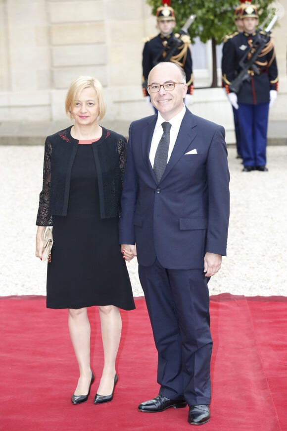 Bernard Cazeneuve et sa femme Véronique - Dîner d'Etat offert au Palais de l'Elysée par François Hollande en l' honneur du président de la République de Singapour. Paris, le 18 mai 2015 