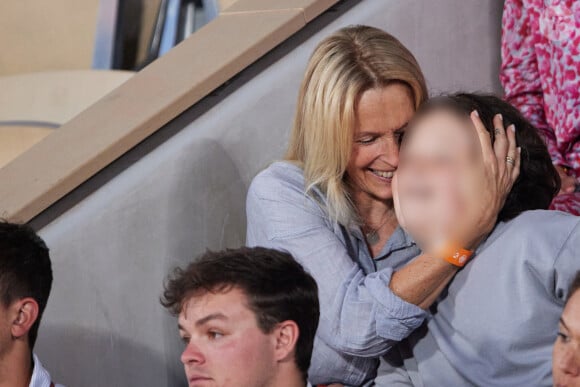 Estelle Lefébure et son fils Giuliano Ramette en tribunes lors des Internationaux de France de tennis de Roland Garros 2023, à Paris, France, le 6 juin 2023. © Jacovides-Moreau/Bestimage 