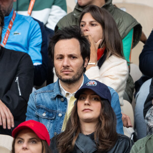 Chaque année, le couple assiste au célèbre tournoi de tennis parisien.
Vianney et sa femme Catherine Robert à Roland Garros. Photo : Alexis Jumeau/ABACAPRESS.COM