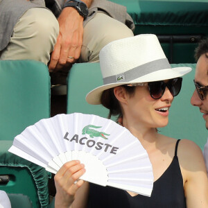 Vianney et sa compagne Catherine Robert dans les tribunes des Internationaux de France de Tennis de Roland Garros à Paris, le 10 juin 2018. © Jacovides/Moreau/Bestimage