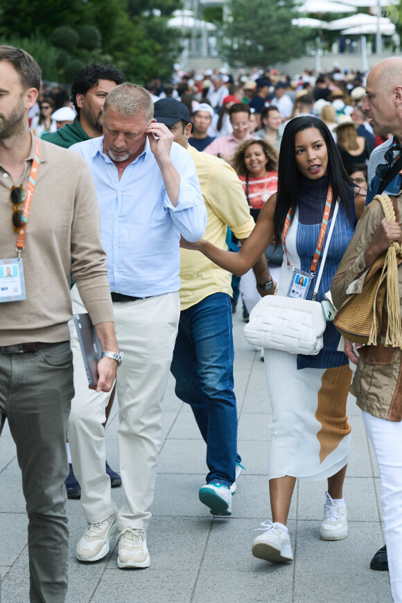 Boris Becker et sa compagne Lilian de Carvalho Monteiro - Célébrités dans les tribunes de la finale Dames des Internationaux de Tennis de Roland Garros à Paris le 8 juin 2024. © Jacovides-Moreau/Bestimage 