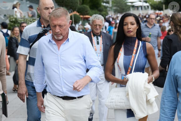 Boris Becker et sa compagne Lilian de Carvalho Monteiro - Célébrités dans les tribunes de la finale Dames des Internationaux de Tennis de Roland Garros à Paris le 8 juin 2024. © Jacovides-Moreau/Bestimage 