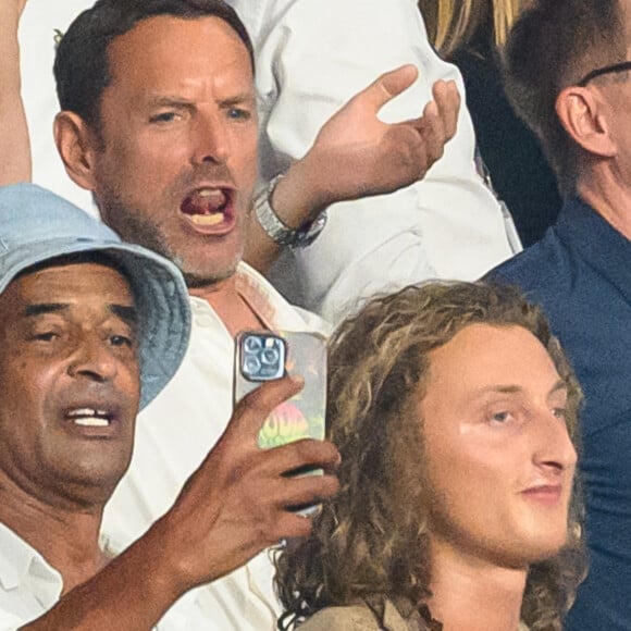 Un amour que le chanteur ne cache pas.

Yannick Noah et son fils Joalukas assistent au match de la Coupe du monde de rugby France 2023 entre la France et la Nouvelle-Zélande au Stade de France le 8 septembre 2023. Laurent Zabulon/ABACAPRESS.COM