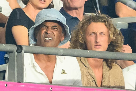 Yannick Noah est un homme heureux
Yannick Noah et son fils Joalukas assistent au match de la Coupe du monde de rugby France 2023 entre la France et la Nouvelle-Zélande au Stade de France le 8 septembre 2023 à Saint-Denis. Laurent Zabulon/ABACAPRESS.COM