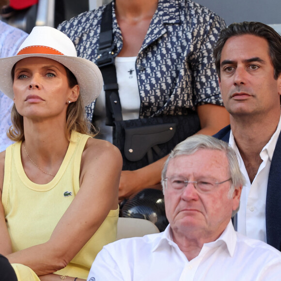 Sylvie Tellier et son mari Laurent Schenten - Célébrités dans les tribunes de la finale homme des Internationaux de France de tennis de Roland Garros 2024 à Paris le 9 juin 2024. © Jacovides-Moreau/Bestimage 