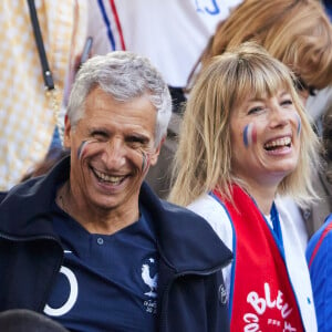 Nagui et sa femme Mélanie Page - Célébrités dans les tribunes du match du groupe D de l'Euro 2024 entre l'équipe de France face à l'Autriche (1-0) à Dusseldorf en Allemagne le 17 juin 2024. © Cyril Moreau/Bestimage