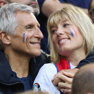 Nagui et sa femme Mélanie Page - Célébrités dans les tribunes du match du groupe D de l'Euro 2024 entre l'équipe de France face à l'Autriche (1-0) à Dusseldorf en Allemagne le 17 juin 2024. © Cyril Moreau/Bestimage