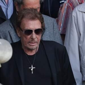 Johnny et Laeticia Hallyday - Sorties des obsèques de Mireille Darc en l'église Saint-Sulpice à Paris. Le 1er septembre 2017 