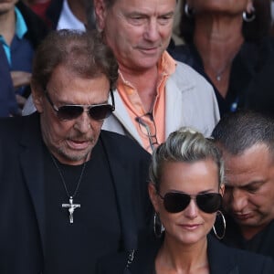 Johnny et Laeticia Hallyday - Sorties des obsèques de Mireille Darc en l'église Saint-Sulpice à Paris. Le 1er septembre 2017 