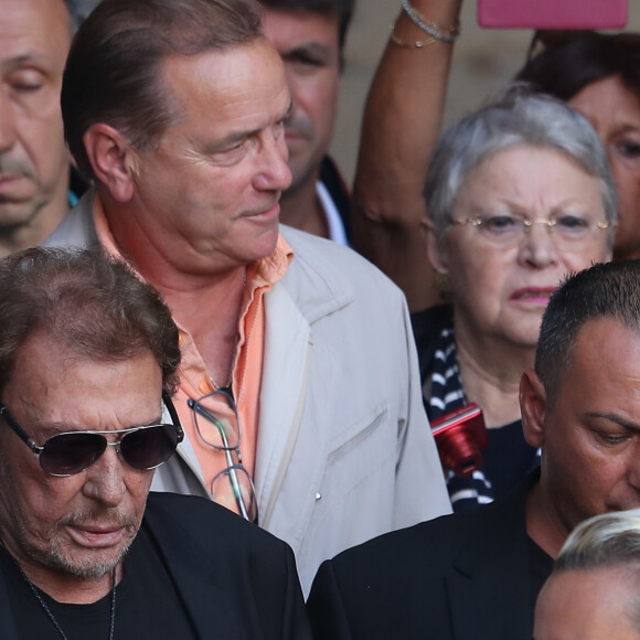 Johnny et Laeticia Hallyday - Sorties des obsèques de Mireille Darc en l'église Saint-Sulpice à Paris. Le 1er septembre 2017 