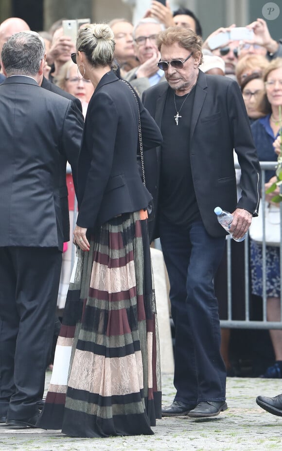 Johnny et Laeticia Hallyday - Obsèques de Mireille Darc en l'église Saint-Sulpice à Paris. Le 1er septembre 2017 