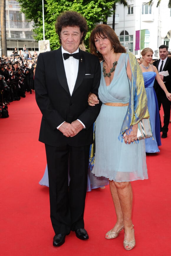Robert Charlebois et son épouse Laurence arrivent sur le tapis rouge de la projection de Grace De Monaco et de la cérémonie d'ouverture qui s'est tenue au Palais Des Festivals à Cannes, en France, le 14 mai 2014 dans le cadre du 67e Festival de Cannes. Photo par Aurore Marechal/ABACAPRESS.COM