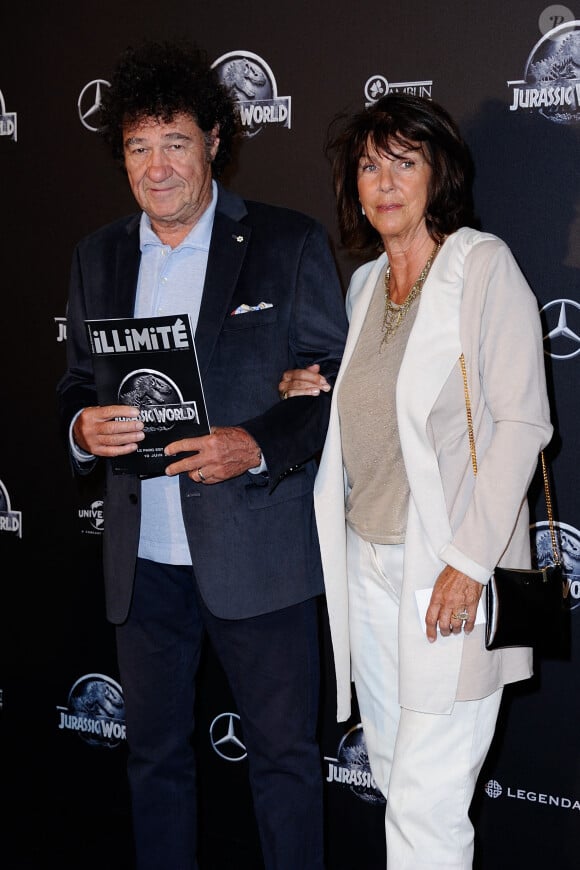 Robert Charlebois et son épouse Laurence assistant à la première de Jurassic World à l'UGC Normandie à Paris, France, le 29 mai 2015. Photo par Aurore Marechal/ABACAPRESS.COM