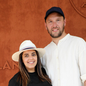 Inès Reg et son compagnon Kevin Debonne - People au village lors des Internationaux de France de Tennis de Roland Garros à Paris. Le 10 juin 2021 © Dominique Jacovides / Bestimage 