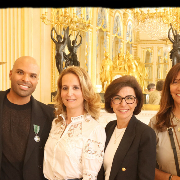 Exclusif - Mathieu Vergne, Saïd Boussif, Alexandra Redde-Amiel, Rachida Dati, Anne Marcassus, Vitaa - La chanteuse Vitaa et le Producteur musical Saïd Boussif élevés par la ministre de la Culture, Rachida Dati au grade de chevalier dans l'ordre des Arts et Lettres dans le salon des Maréchaux au ministère de la Culture à Paris le 24 juin 2024. © Dominique Jacovides - Alain Guizard / Bestimage 
