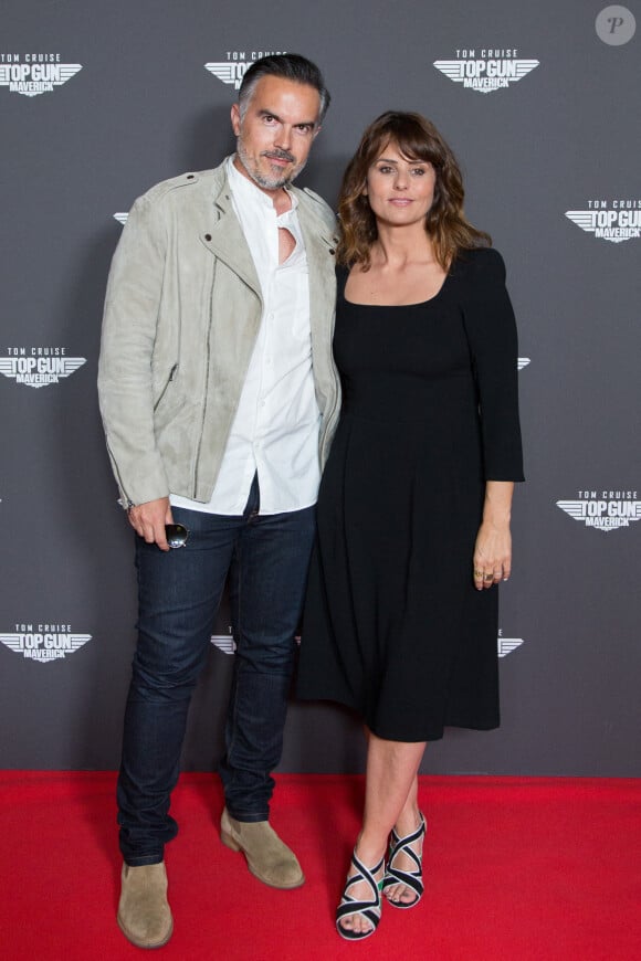 
Maxime Chattam et son épouse Faustine Bollaert assistent à l'avant-première du film "Top Gun Maverick" à l'UGC Normandie à Paris le 19 mai 2022 à Paris. Nasser Berzane/ABACAPRESS.COM