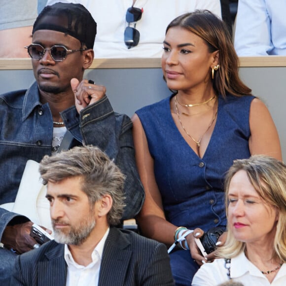 Black M et sa compagne Léa Djadja en tribunes lors des Internationaux de France de tennis de Roland Garros 2023, à Paris, France, le 6 juin 2023. © Jacovides-Moreau/Bestimage