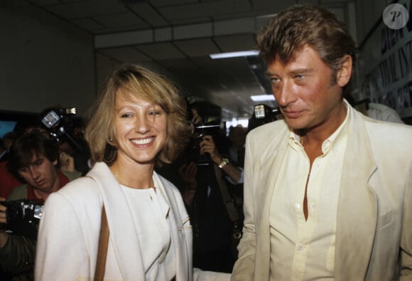 En France, à Cannes, Nathalie BAYE et son compagnon Johnny Hallyday en 1984 © Michel Croizard via Bestimage