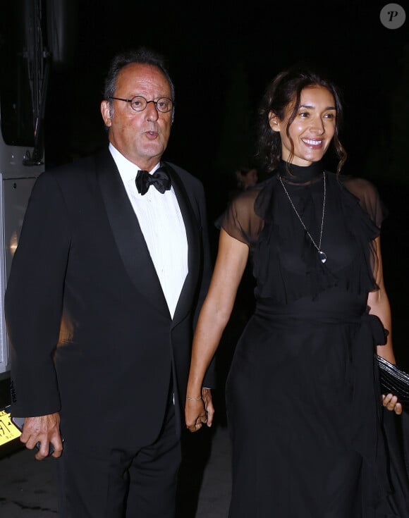 lui qui estime que ses deux précédents mariages n'étaient pas des erreurs, mais des chemins vers celle qu'il aime aujourd'hui.
Jean Reno et sa femme Zofia Borucka - Les célébrités arrivent au 50ème anniversaire de la marque Ralph Lauren à New York le 7 septembre 2018.