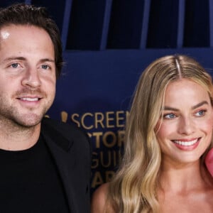 Margot Robbie et Tom Ackerley lors de la 30ème cérémonie des Screen Actors Guild Awards à Los Angeles