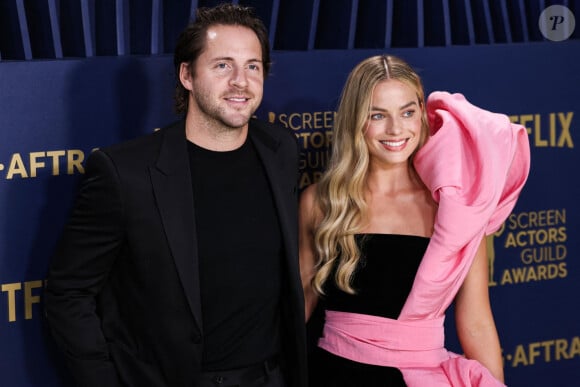 Margot Robbie et Tom Ackerley lors de la 30ème cérémonie des Screen Actors Guild Awards à Los Angeles