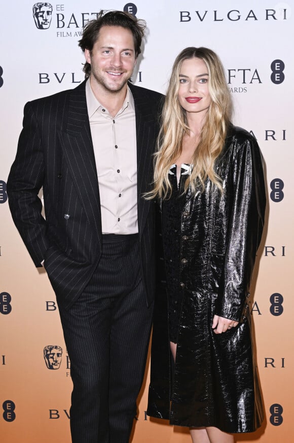 Dernièrement, plusieurs sources contactées par le magazine People ont déclaré que l'interprète de Harley Quinn attendrait son premier enfant.
Tom Ackerley et Margot Robbie lors du photocall de la soirée des nominés BAFTA 2024 au National Gallery de Londres, le 17 février 2024