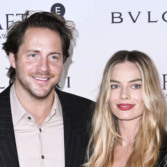 Dernièrement, plusieurs sources contactées par le magazine People ont déclaré que l'interprète de Harley Quinn attendrait son premier enfant.
Tom Ackerley et Margot Robbie lors du photocall de la soirée des nominés BAFTA 2024 au National Gallery de Londres, le 17 février 2024