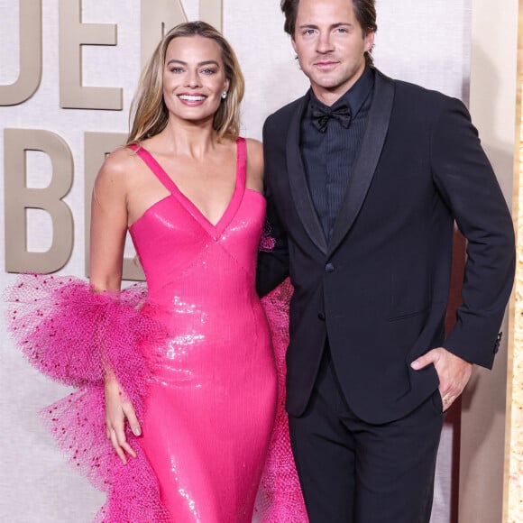 Margot Robbie et Tom Ackerley au photocall de la 81ème cérémonie des Golden Globes au Beverly Hilton à Los Angeles le 7 janvier 2024