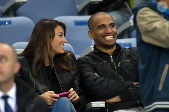 RACHEL LEGRAIN TRAPANI ET SON MARI AURELIEN CAPOUE (FOOTBALEUR) - PEOPLE AU MATCH DE FOOTBALL FRANCE - BIELORUSSIE AU STADE DE FRANCE A SAINT DENIS LE 11 SEPTEMBRE 2012. LA FRANCE A REMPORTE LE MATCH SUR LE SCORE DE 3 A 1.