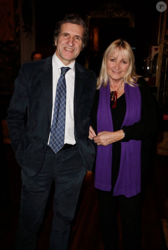 Gérard Leclerc et son épouse Julie Leclerc lors du dévoilement de la figure de cire du Père Noël par Coca Cola au Musée Grevin à Paris, le 20 novembre 2013. Jérôme Domine/ABACAPRESS.COM