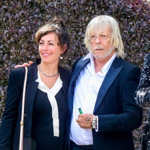 Le chanteur Renaud (Renaud Séchan) et sa compagne Cerise (de son vrai prénom Christine) - Mariage d'Hugues Aufray et de Murielle Mégevand à la mairie de Marly-Le Roy, France