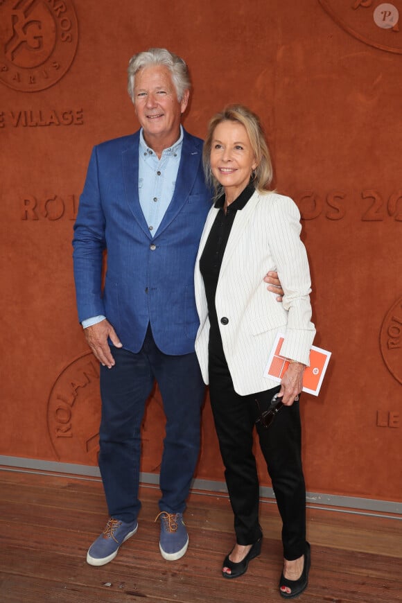 Pierre Dhostel et sa femme Carole au village lors des internationaux de tennis de Roland Garros à Paris, le 9 juin 2018. © Cyril Moreau/Bestimage