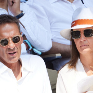 Julien Courbet et sa femme Catherine en tribunes lors des Internationaux de France de tennis de Roland Garros 2023, à Paris, France, le 6 juin 2023. © Jacovides-Moreau/Bestimage